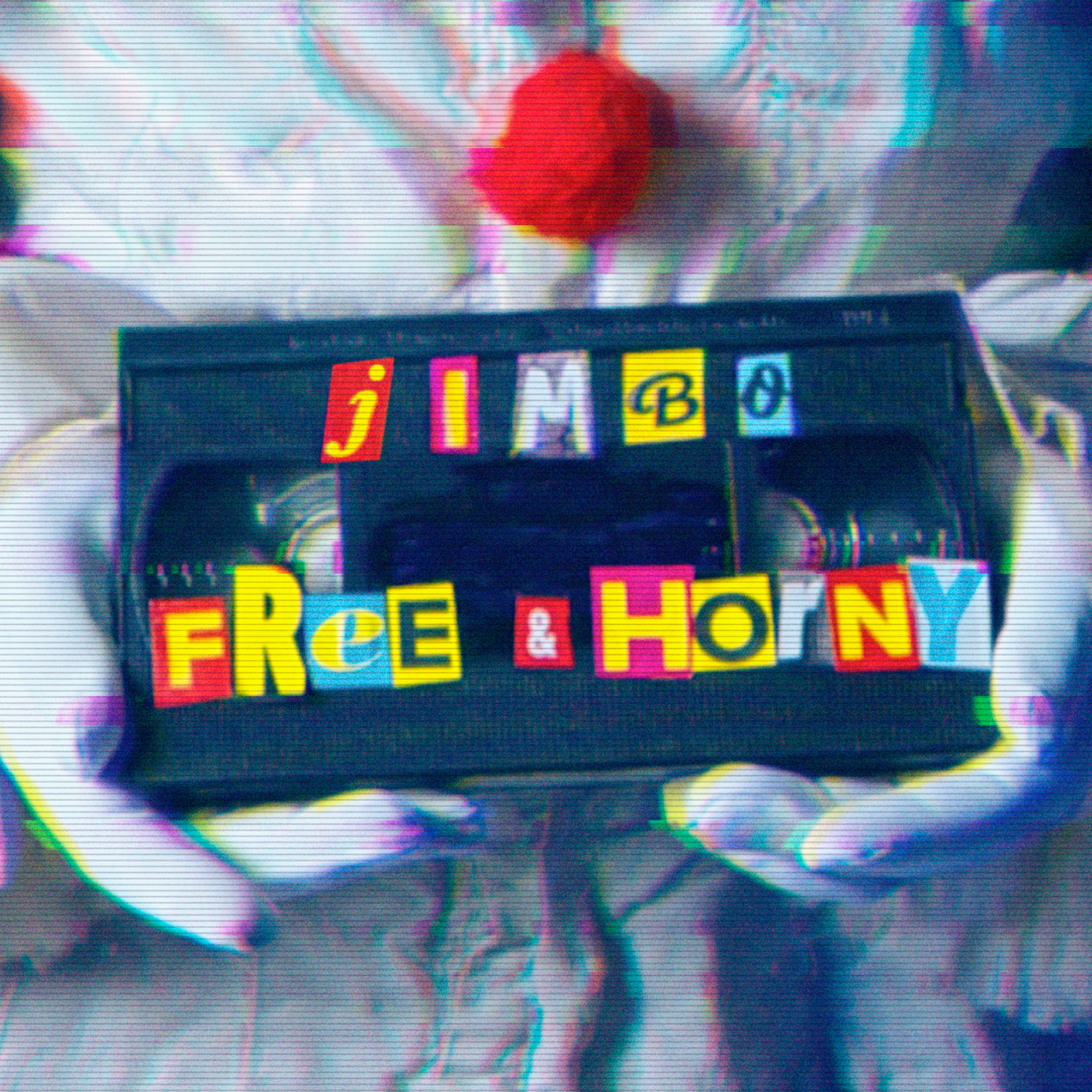Close up of Pennywise holding a VHS tape with "Jimbo Free & Horny" written in cutout magazine letters.